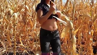 Young Brunette Gets Covered In Cum While Working On A Corn Field